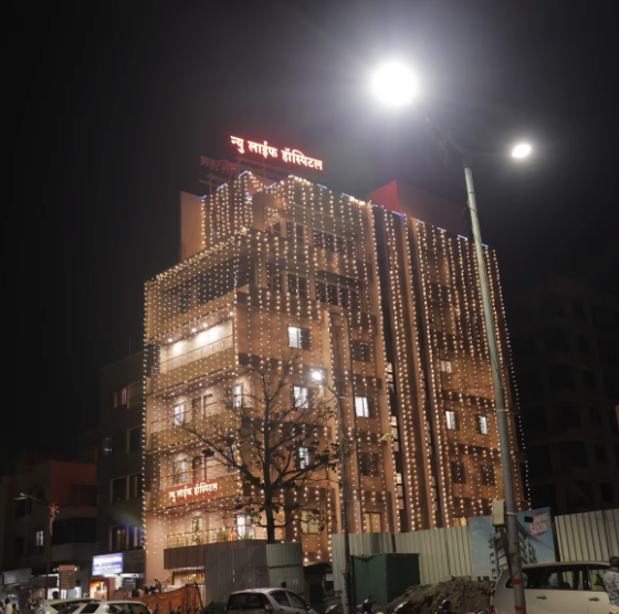 New Life Hospital building illuminated at night, Panchavati, Nashik